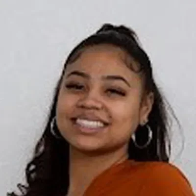 Headshot of Peresphone Akins, a massage therapist
